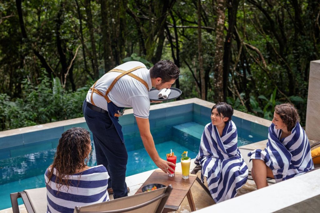 People beings served in the pool