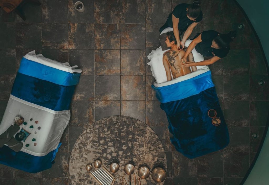 Top-down view of a luxury spa treatment room at El Silencio, featuring ancestral wellness therapies and natural decor.
